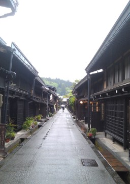 Ash-covered wooden shopfronts in Takayama, Japan